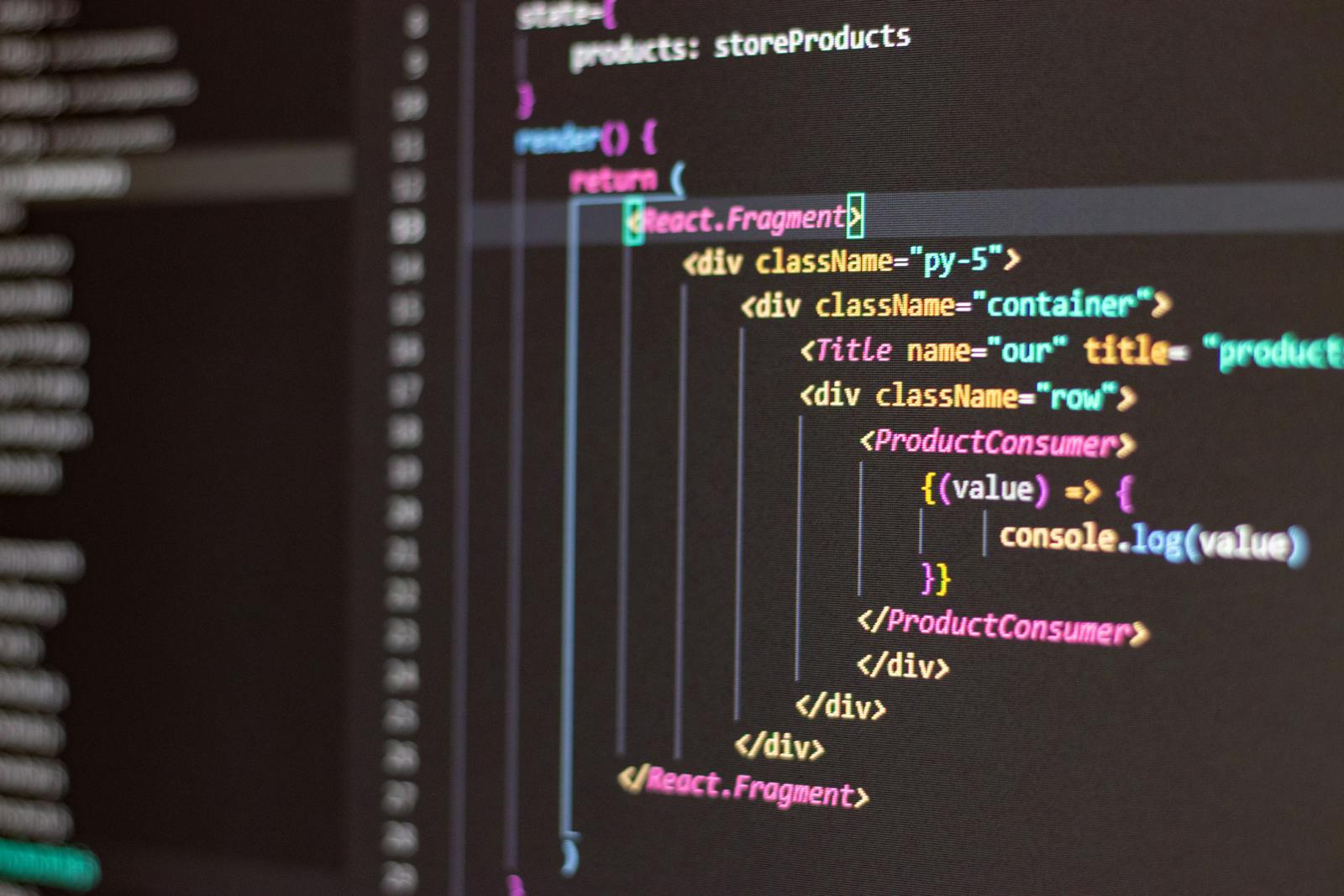 Close-up of React JSX code in a dark code editor — photo by Antonio Batinic on Pexels