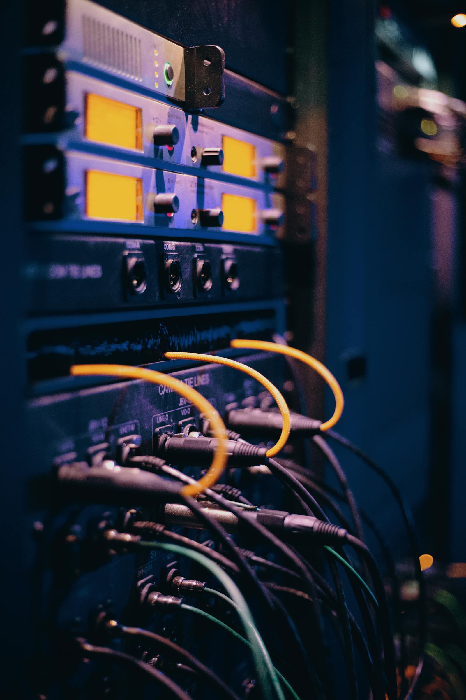 Close-up of a server rack with networking cables — photo by Josh Sorenson on Pexels