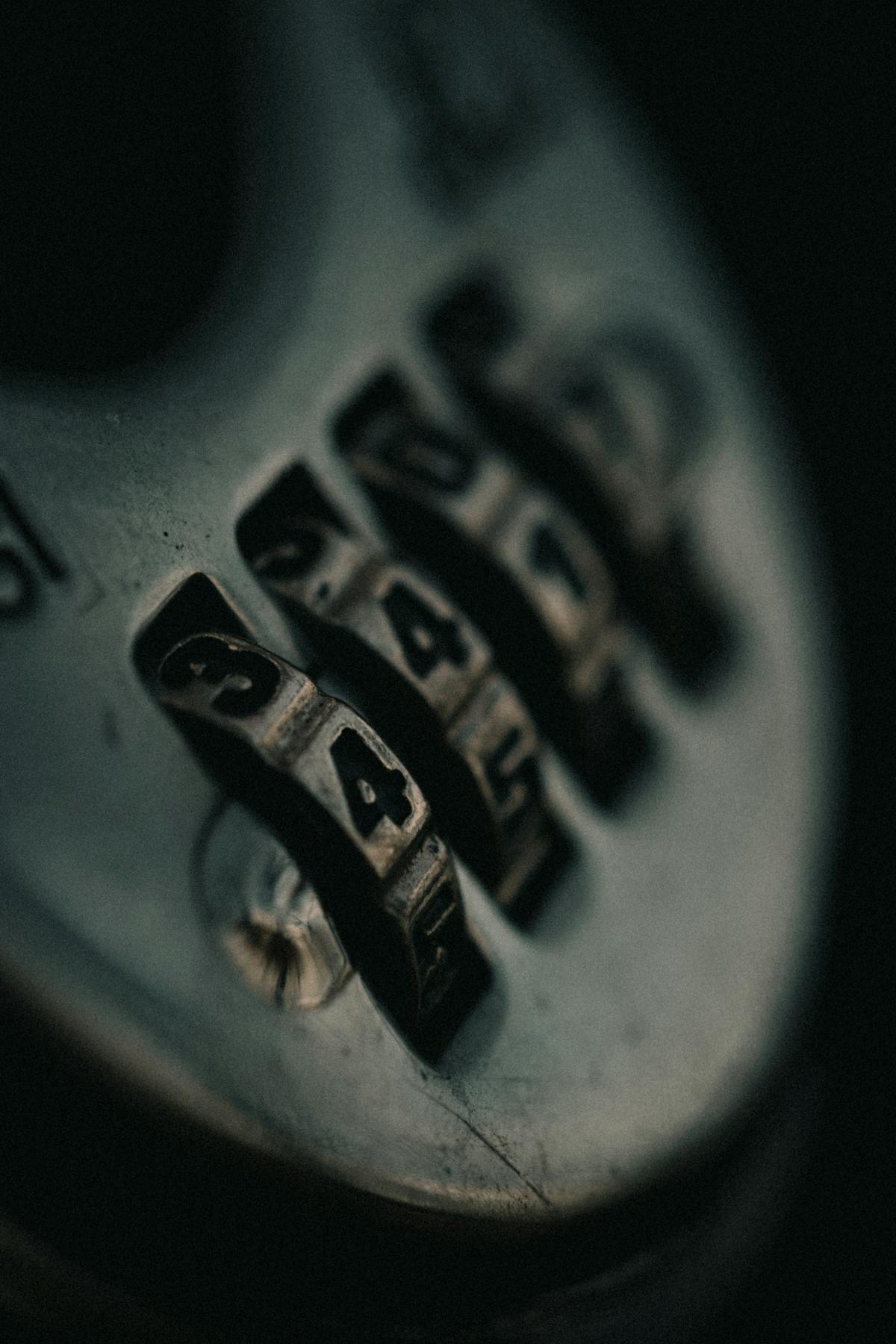 Close-up of a metal combination lock with rotating numeric dials — visual metaphor for rotating WordPress salts to a new secret combination (photo: Felix Moeller / Pexels)