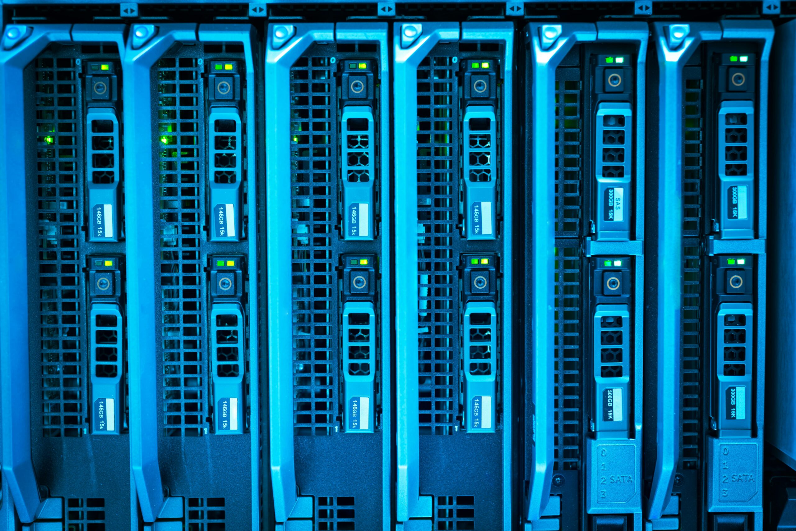 Server blade chassis with blue LED illumination — photo by Cookiecutter on Pexels